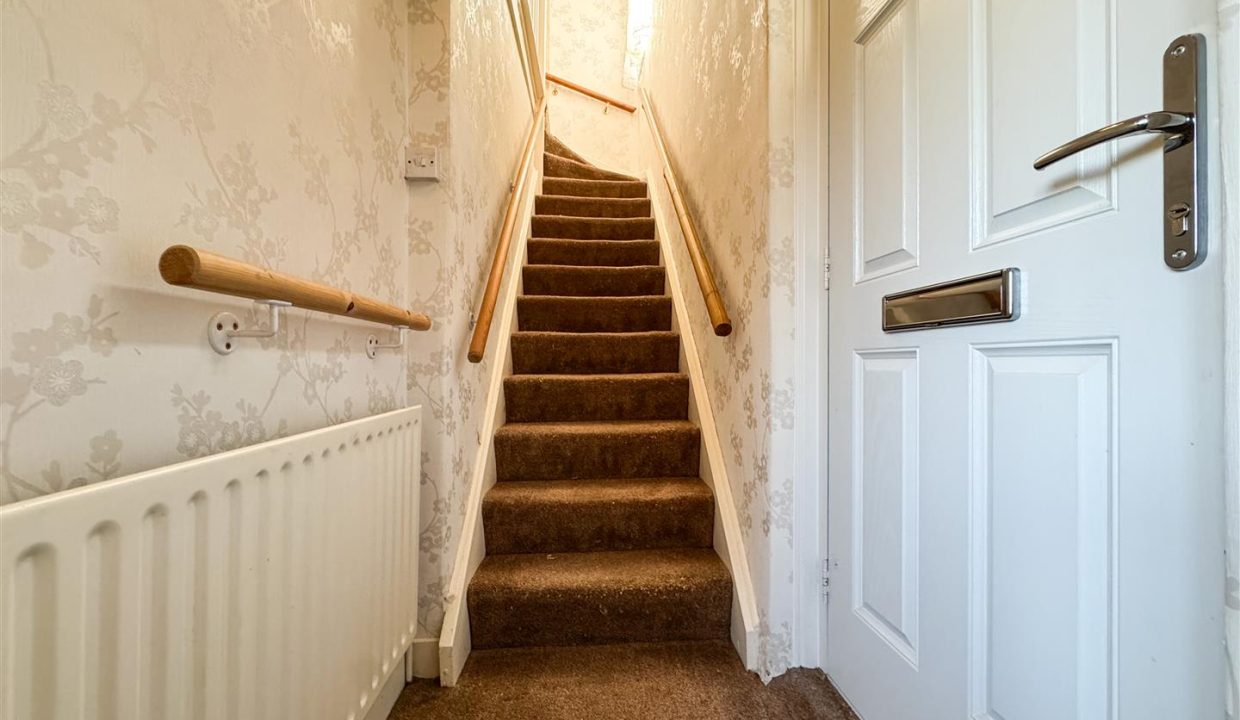 STAIRS RISING TO THE FIRST FLOOR