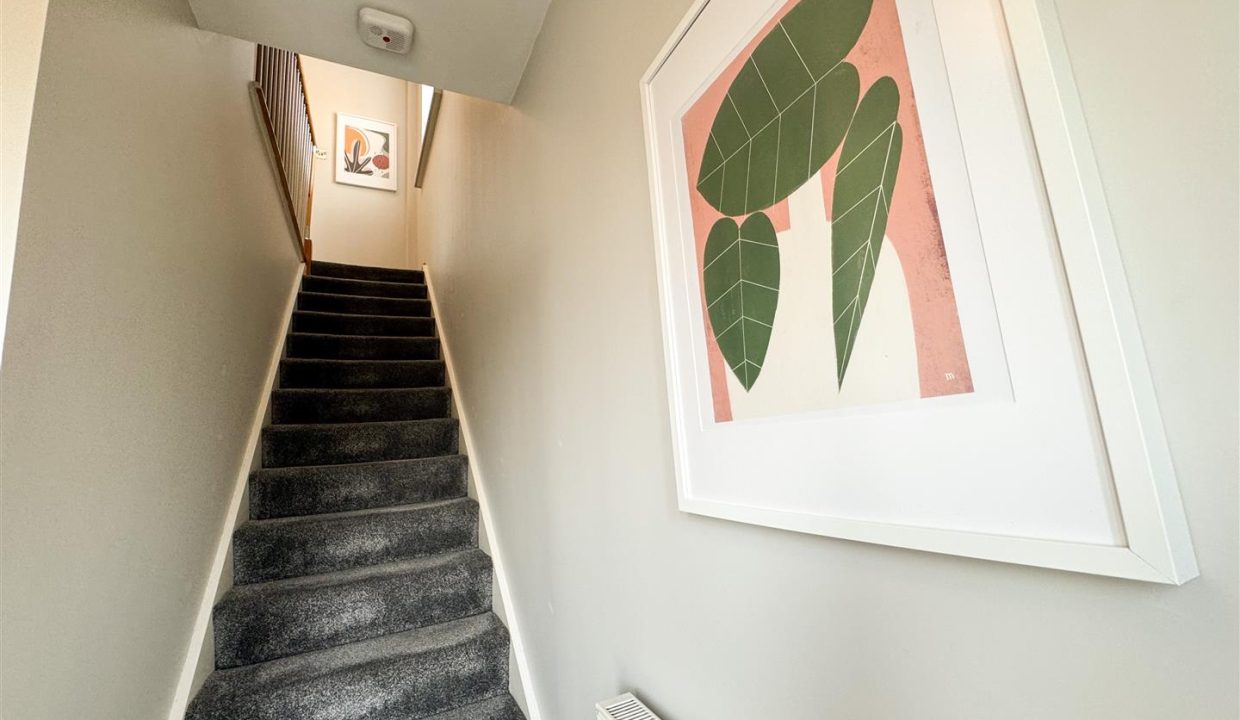 STAIRS RISING TO FIRST FLOOR