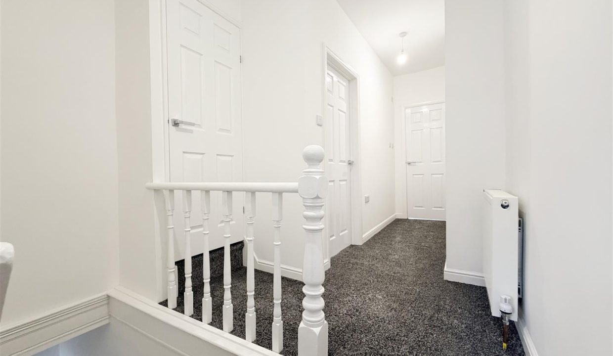 STAIRS RISING TO THE FIRST FLOOR