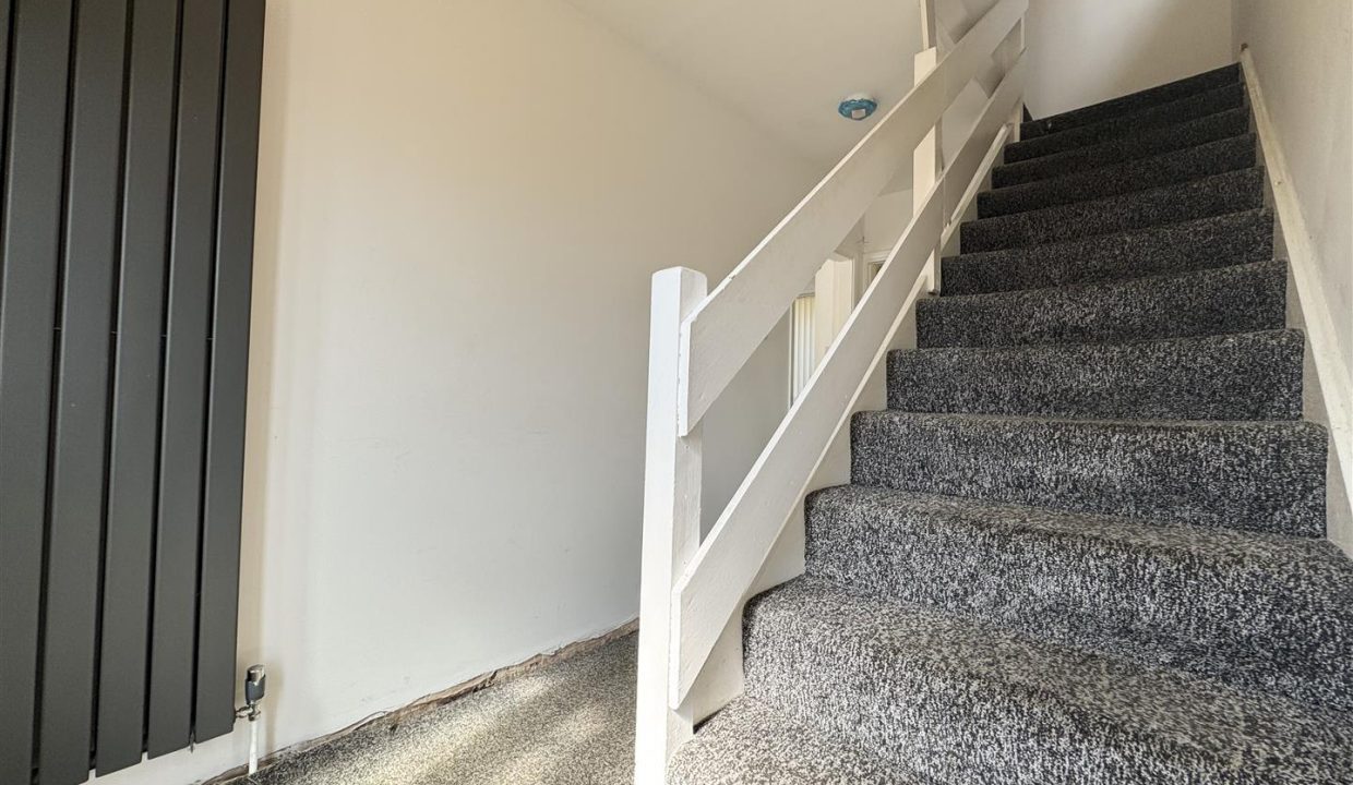STAIRS RISING TO FIRST FLOOR